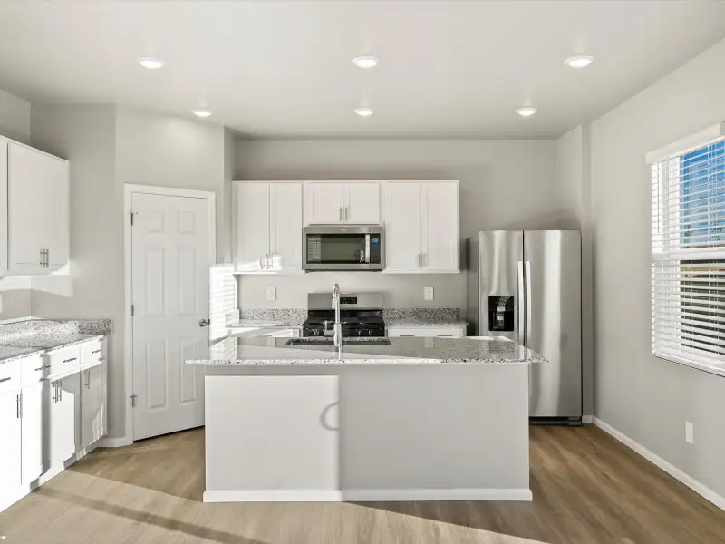 Furnished interior view inside a new home in Lorson Ranch : The Springs Collection, Colorado Springs (Image 4).