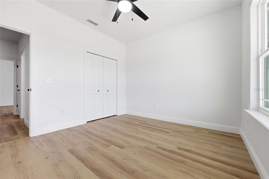 Spacious, unfurnished interior of a new home in Grand Oaks, Gainesville (Image 24).