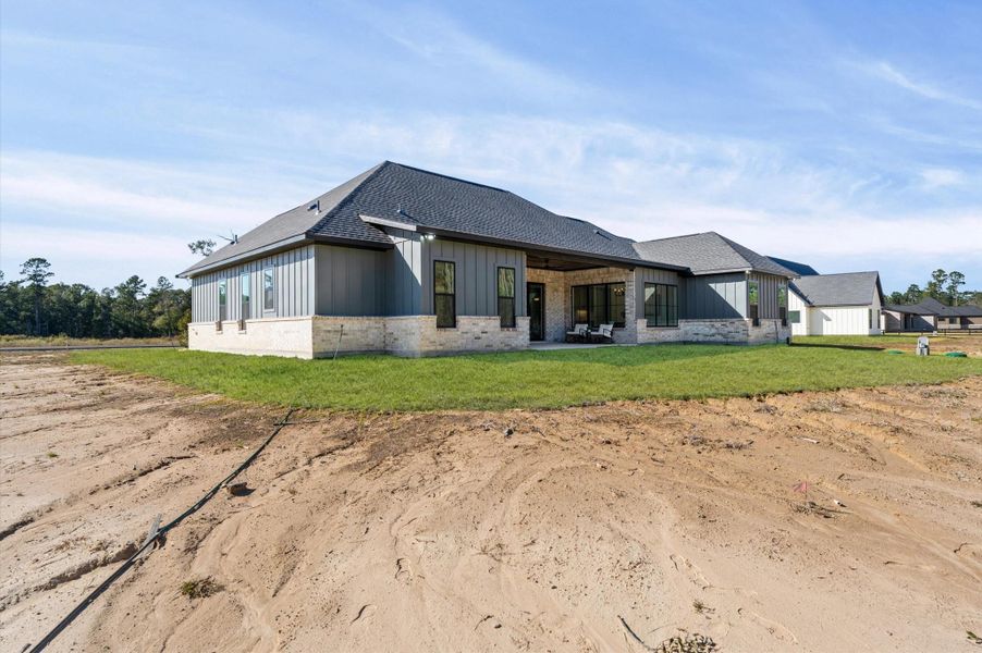 Exterior details and patio area of a home in , Conroe (Image 4).