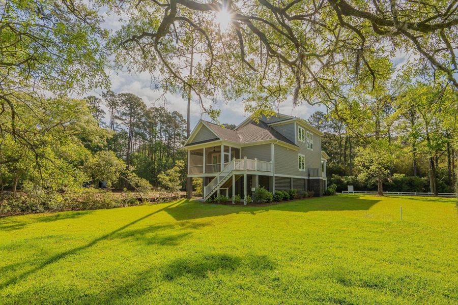 Exterior details and patio area of a home in , Johns Island (Image 38).