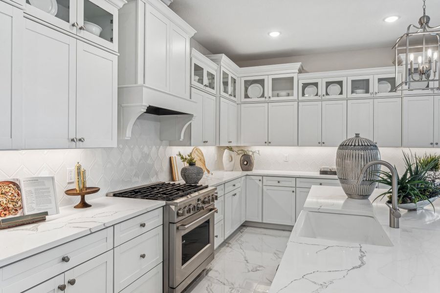 Kitchen with glass upper cabinets