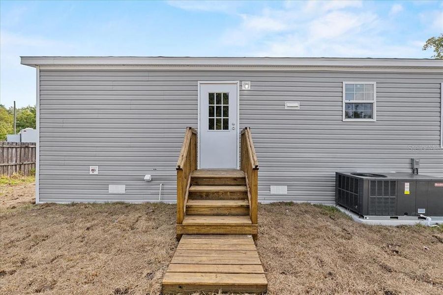 Exterior details and patio area of a home in , Holiday (Image 22).