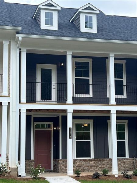 Front exterior of a new home in The Park at Gainesville Township, Gainesville, GA, highlighting curb appeal (Image 31). Front exterior of a new home in The Park at Gainesville Township, Gainesville, GA, highlighting curb appeal (Image 31).
