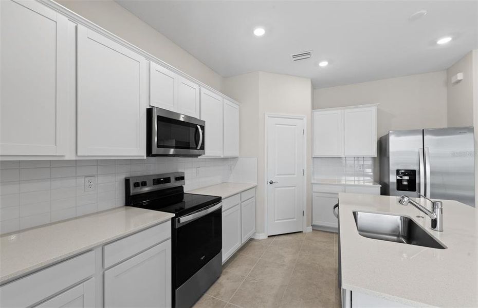 Furnished interior view inside a new home in The Strand at Cedar Grove, North Port (Image 5).