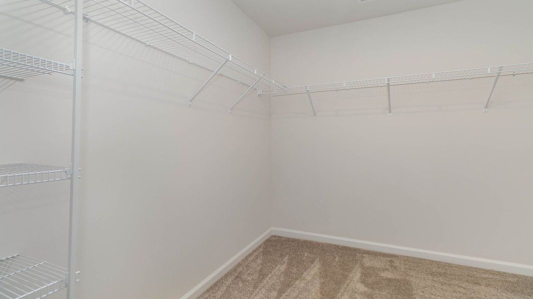 Representative unfurnished interior of a home built from the CALI by D.R. Horton in Heritage Crossing, Conway (Image 10).