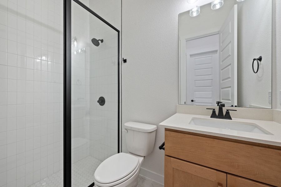 Furnished interior view inside a new home in Wolf Ranch, Georgetown (Image 16).
