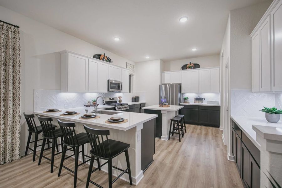 Representative furnished interior of a home built from the Shelby by Chesmar Homes in Buffalo Crossing, Cibolo (Image 8).