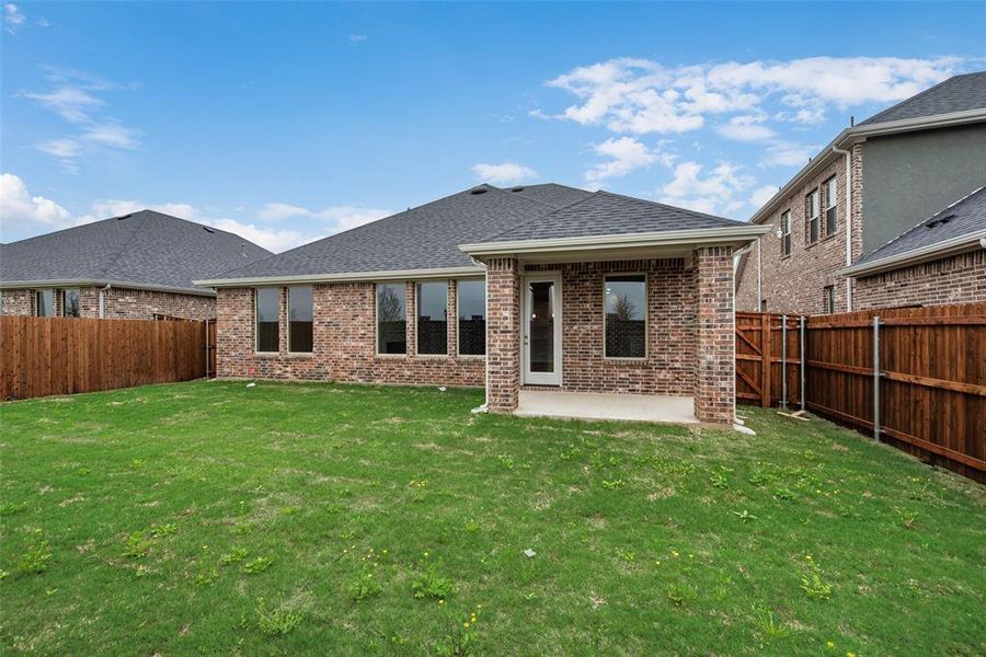 Front exterior of a new home in Sutton Fields, Celina, TX, highlighting curb appeal (Image 19). Front exterior of a new home in Sutton Fields, Celina, TX, highlighting curb appeal (Image 19).