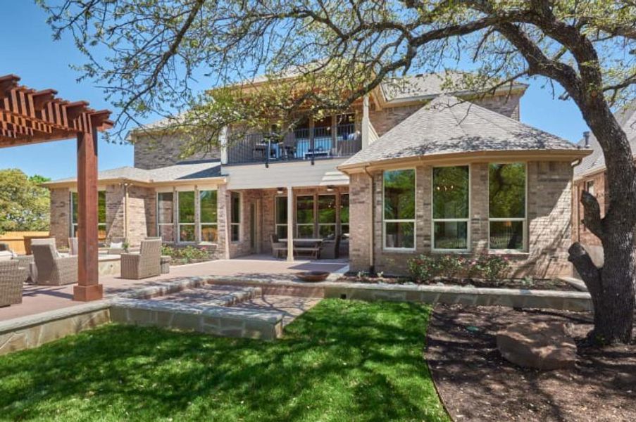 Photo of Pulte model home with same floor plan, not of actual home listed.