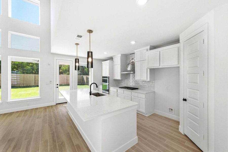 Furnished interior view inside a new home in The Colony, Bastrop (Image 8).