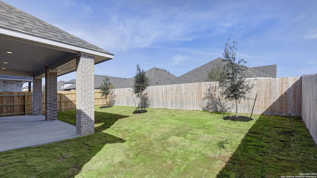 Exterior details and patio area of a home in Corley Farms 50', Boerne (Image 4).