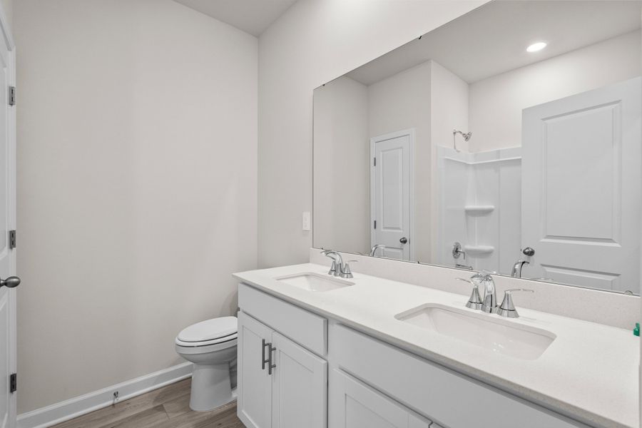 Furnished interior view inside a new home in Cypress Ridge - The Coastline Series, Longs (Image 10).