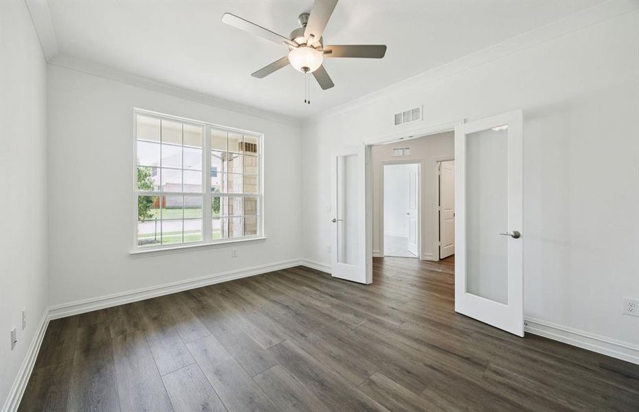 Airy study with glass doors Airy study with glass doors