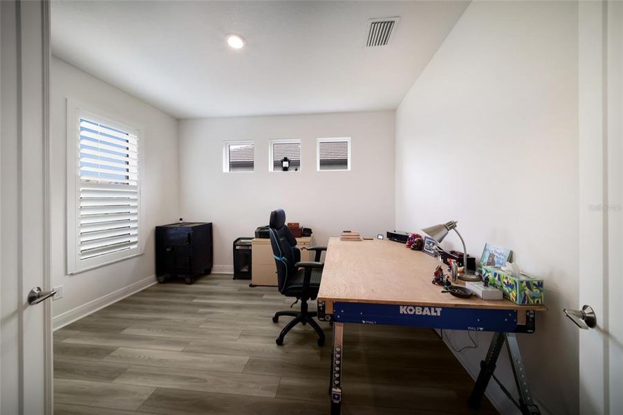Furnished interior view inside a new home in Sweetwater at Lakewood Ranch, Bradenton (Image 38).