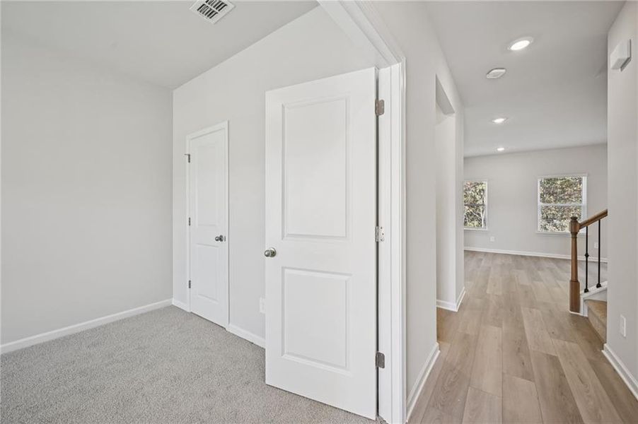 Spacious, unfurnished interior of a new home in Creekside at Oxford Park, Fairburn (Image 31).
