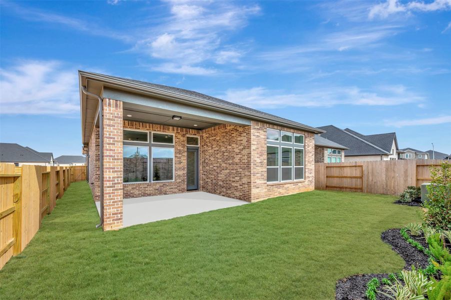 Exterior details and patio area of a home in Grange 45' Homesites, Katy (Image 3).