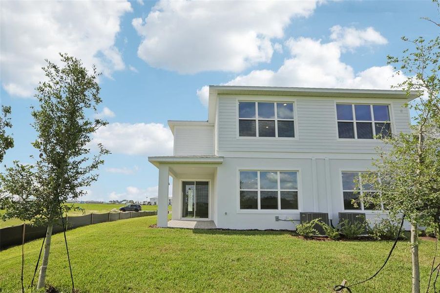 Front exterior of a new home in Isla Mirada, San Antonio, FL, highlighting curb appeal (Image 2).