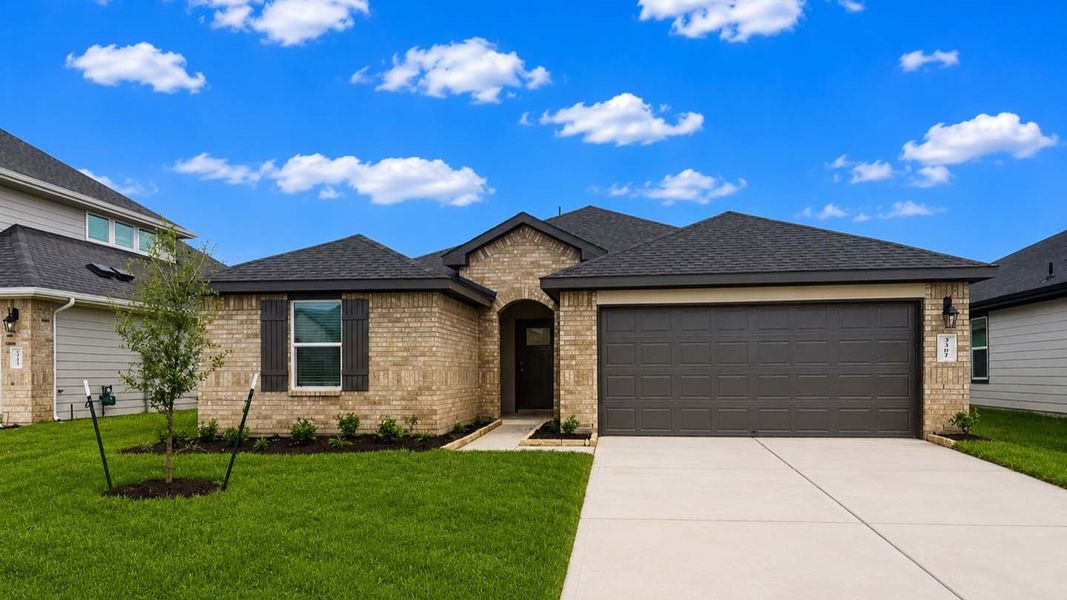 Front exterior of a new home in Tamarron, Fulshear, TX, highlighting curb appeal (Image 1). Front exterior of a new home in Tamarron, Fulshear, TX, highlighting curb appeal (Image 1).