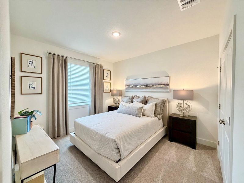 Furnished interior view inside a new home in Koenig Townhomes, Austin (Image 14). Furnished interior view inside a new home in Koenig Townhomes, Austin (Image 14).