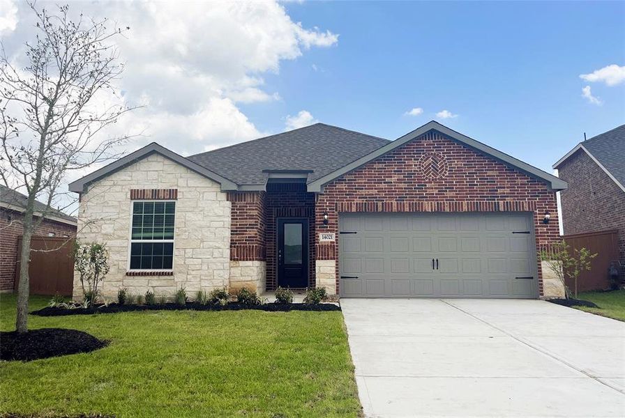 The Atchison Plan features 3 bedrooms, 2 bathrooms, and a beautiful front yard landscaping package. Completed example being built at 14021 Freeboard Drive.