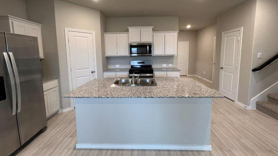 Kitchen- All Home and community information, including pricing, included features, terms, availability and amenities, are subject to change at any time without notice or obligation. All Drawings, pictures, photographs, video, square footages, floor plans, elevations, features, colors and sizes are approximate for illustration purposes only and will vary from the homes as built. Kitchen- All Home and community information, including pricing, included features, terms, availability and amenities, are subject to change at any time without notice or obligation. All Drawings, pictures, photographs, video, square footages, floor plans, elevations, features, colors and sizes are approximate for illustration purposes only and will vary from the homes as built.