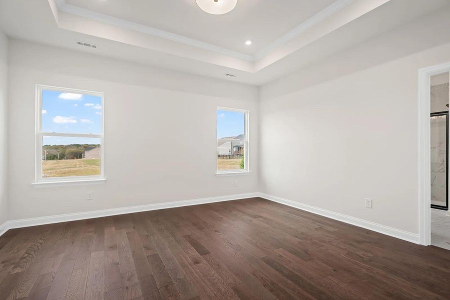 The Oakland A Primary Suite Bedroom