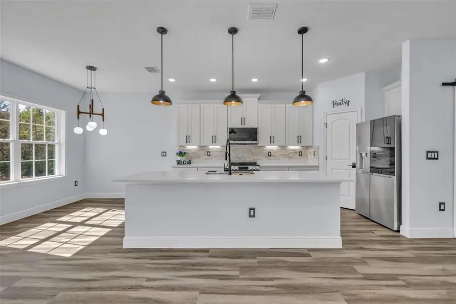 Furnished interior view inside a new home in , Poinciana (Image 10). Furnished interior view inside a new home in , Poinciana (Image 10).