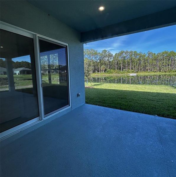 Exterior details and patio area of a home in Coastal Gardens at Town Center, Palm Coast (Image 2).