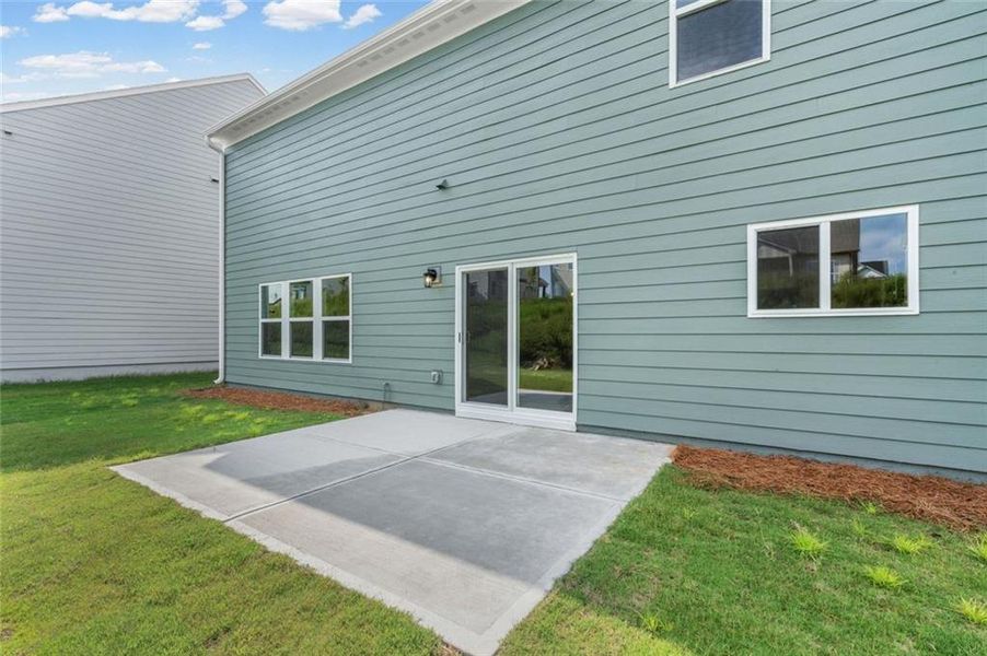 Exterior details and patio area of a home in Twin Lakes, Hoschton (Image 23).