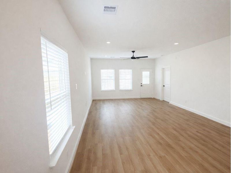 Spacious, unfurnished interior of a new home in Hill & Dale Ranch, Splendora (Image 7). Spacious, unfurnished interior of a new home in Hill & Dale Ranch, Splendora (Image 7).