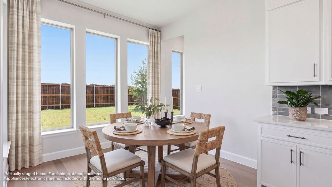 Furnished interior view inside a new home in Mustang Lakes, Celina (Image 8).