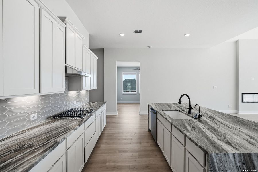 Furnished interior view inside a new home in Potranco Oaks, Castroville (Image 8).