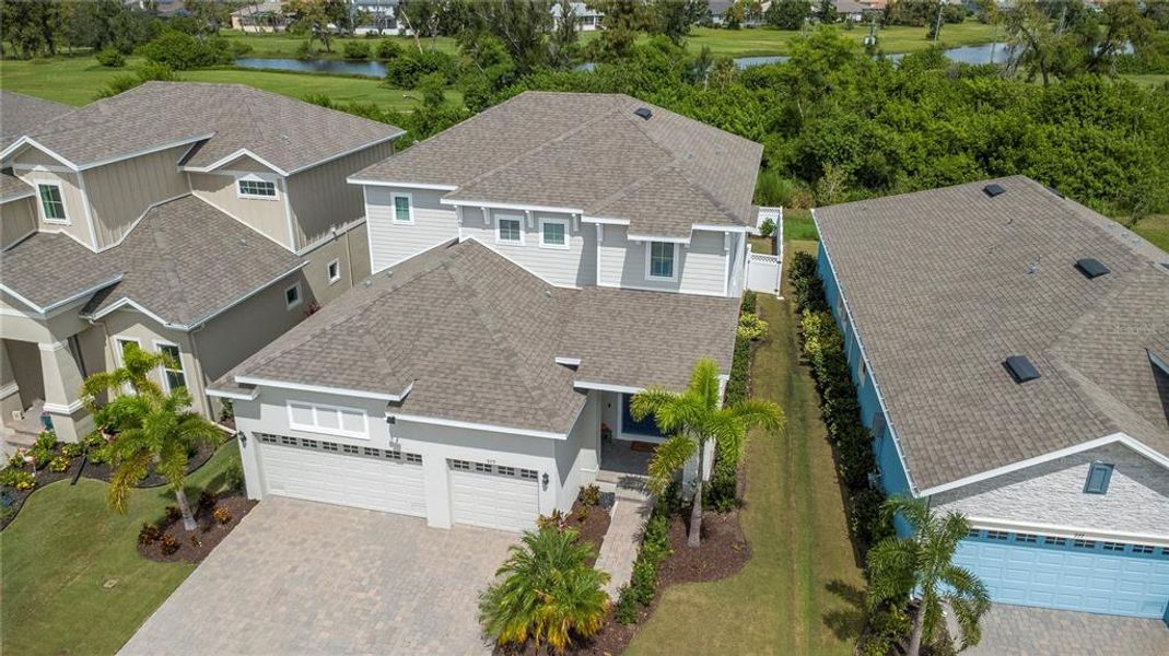 Front exterior of a new home in , Apollo Beach, FL, highlighting curb appeal (Image 22). Front exterior of a new home in , Apollo Beach, FL, highlighting curb appeal (Image 22).