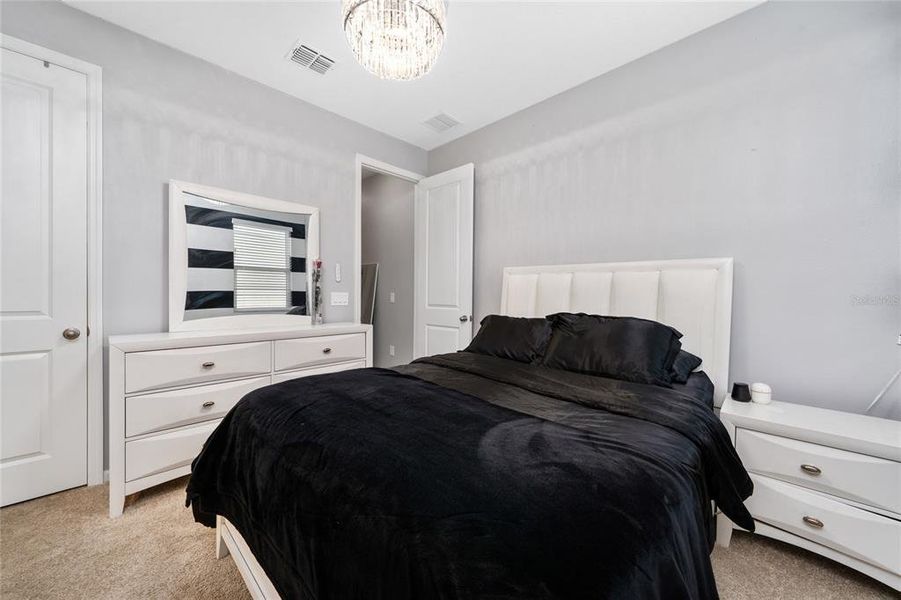 Furnished interior view inside a new home in Seasons at Big Sky, Kissimmee (Image 10).