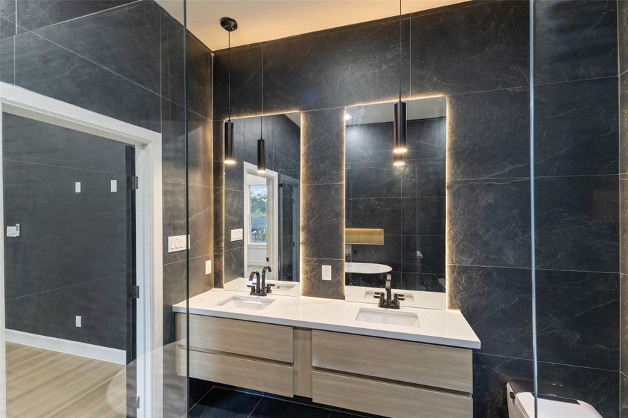 . Walk-in closet with built-ins — his and hers, no fighting . Walk-in closet with built-ins — his and hers, no fighting