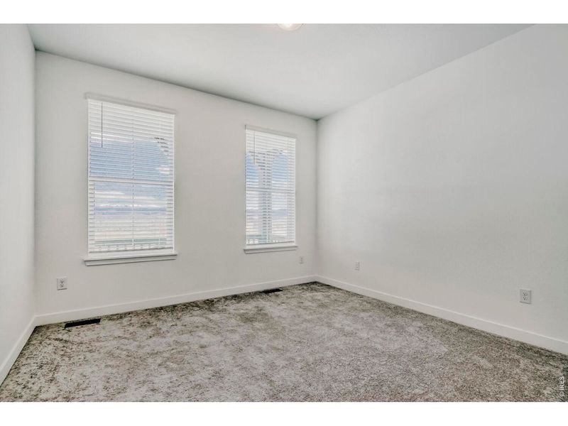 Spacious, unfurnished interior of a new home in Sunset Village, Erie (Image 22).