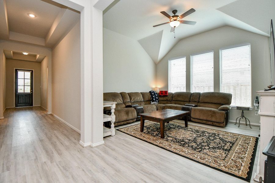 Long foyer with high ceilings opens up to a Gameroom or Den use and a double door Study Long foyer with high ceilings opens up to a Gameroom or Den use and a double door Study