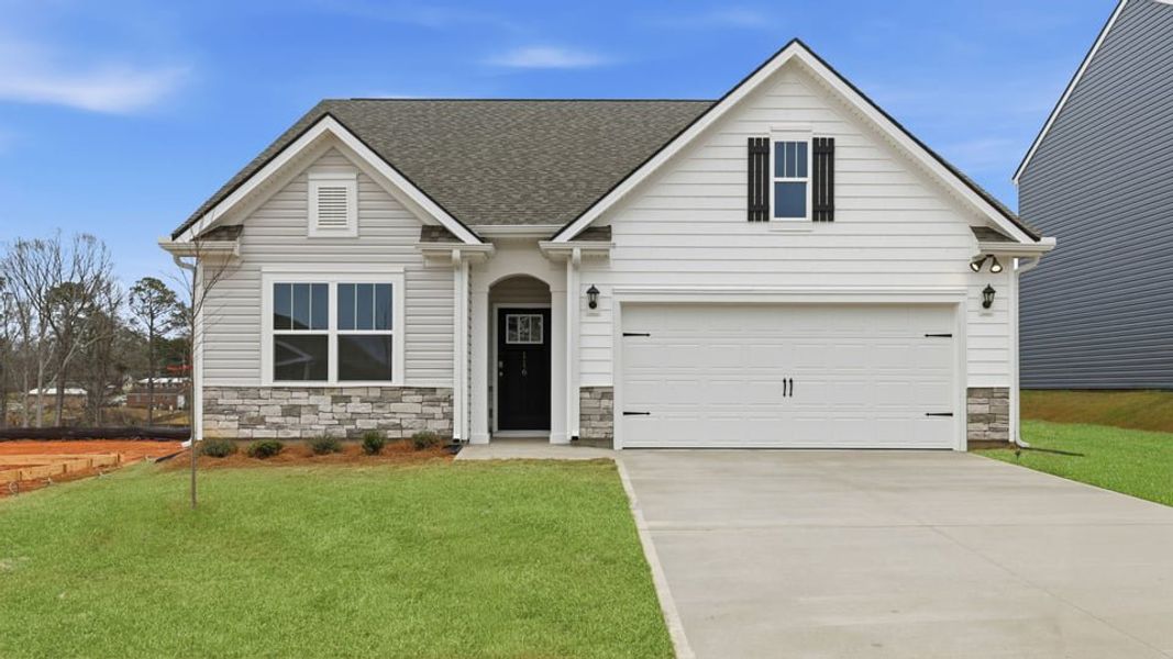 Front exterior of a new home in Durbin Meadows Traditions, Fountain Inn, SC, highlighting curb appeal (Image 1). Front exterior of a new home in Durbin Meadows Traditions, Fountain Inn, SC, highlighting curb appeal (Image 1).