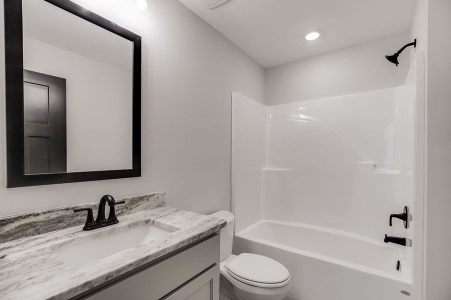 Furnished interior view inside a new home in LOVVORN ESTATES, Carrollton (Image 31).