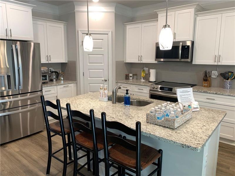 Furnished interior view inside a new home in Holiday Pines, Buford (Image 11).