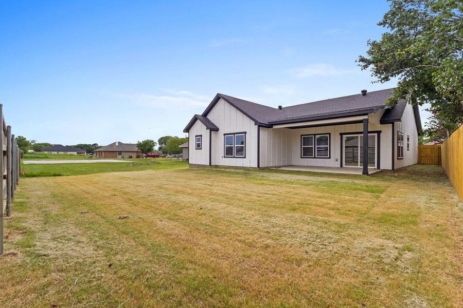 Front exterior of a new home in , Kaufman, TX, highlighting curb appeal (Image 21).
