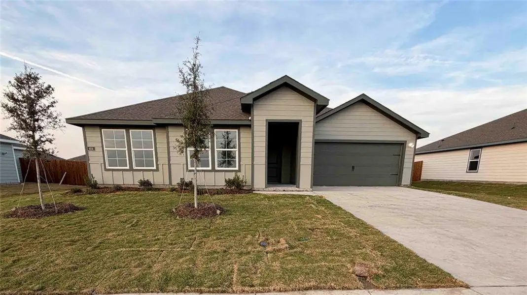 Front exterior of a new home in Waverly Estates, Josephine, TX, highlighting curb appeal (Image 9).