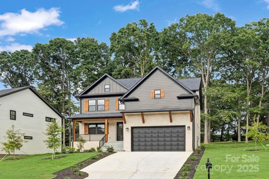 Front exterior of a new home in , Charlotte, NC, highlighting curb appeal (Image 25).