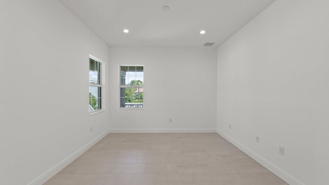 Spacious, unfurnished interior of a new home in Verandah Real Estate and Homes for Sale in Fort Myers, FL - Neal Communities, Fort Myers (Image 28).