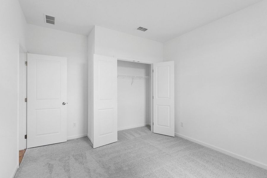 Representative unfurnished interior of a home built from the Moreland by Taylor Morrison in Weatherfield, Buford (Image 32).