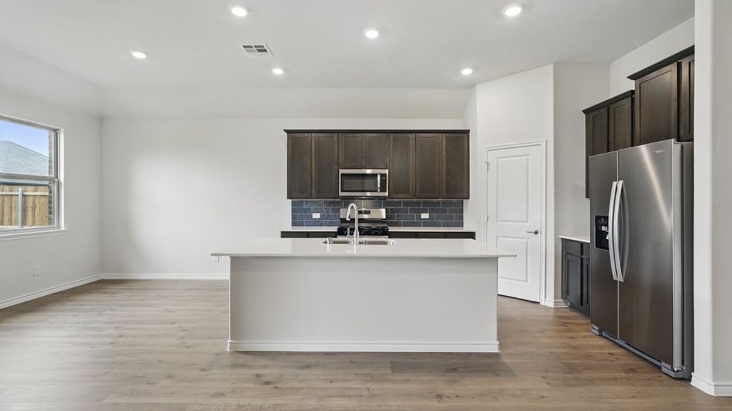 Furnished interior view inside a new home in Lakewood Trails, Forney (Image 6).