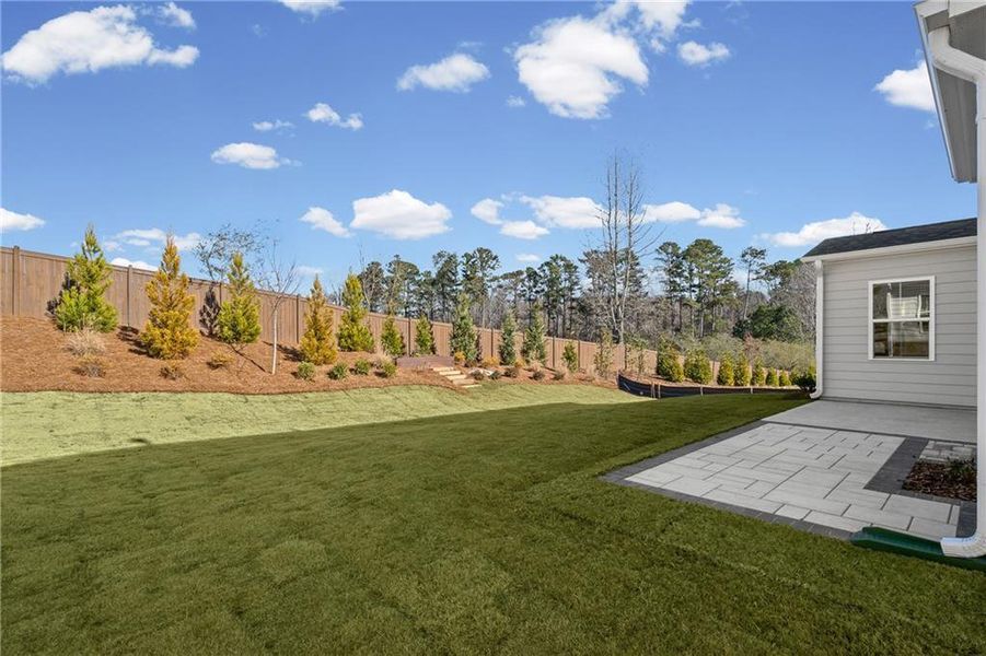 Exterior details and patio area of a home in Berkeley Mill, Cumming (Image 3).