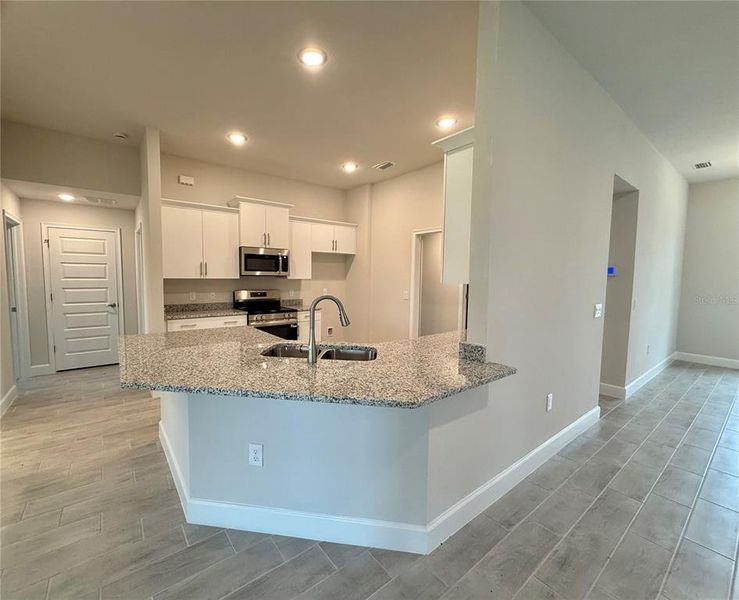 Furnished interior view inside a new home in South Gulf Cove, Port Charlotte (Image 4).