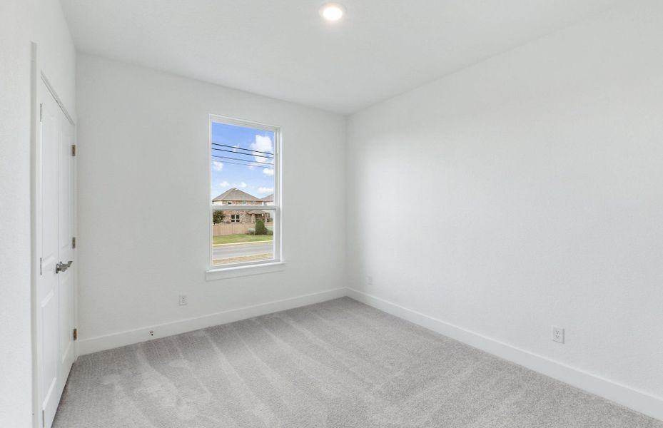 Spacious, unfurnished interior of a new home in Northpoint at Old Settlers, Round Rock (Image 25).