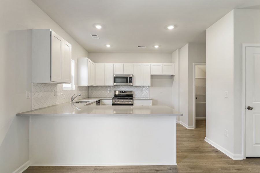 Furnished interior view inside a new home in Richmond Hill, Inman (Image 6).